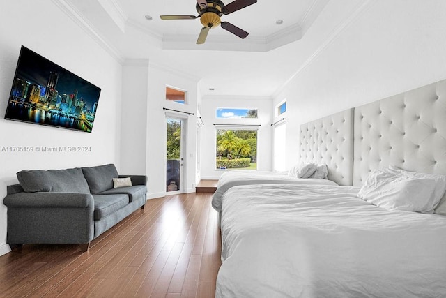 bedroom featuring hardwood / wood-style flooring, ceiling fan, crown molding, and access to outside