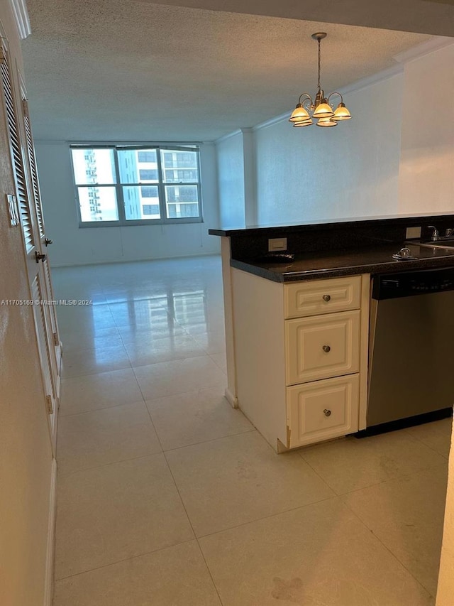 kitchen featuring white cabinets, a textured ceiling, pendant lighting, dishwasher, and a chandelier