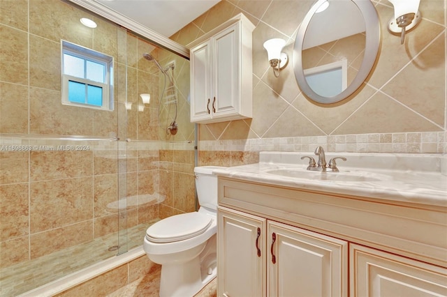 bathroom with walk in shower, vanity, toilet, and tile walls