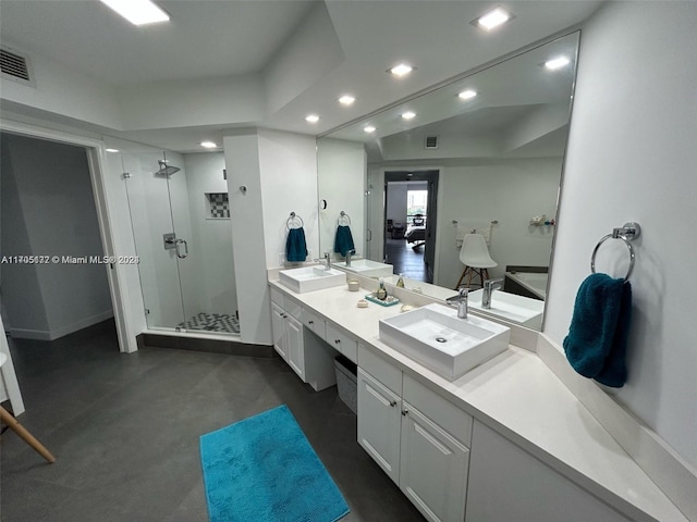 bathroom featuring vanity and walk in shower