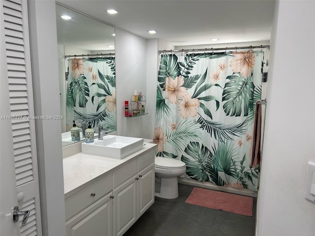 bathroom featuring a shower with curtain, vanity, and toilet