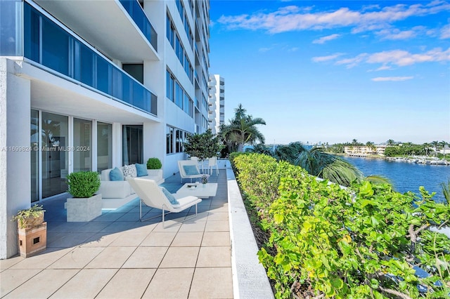 view of patio featuring a water view