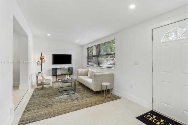 living room with vaulted ceiling