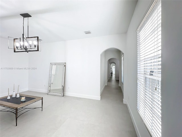 interior space featuring an inviting chandelier