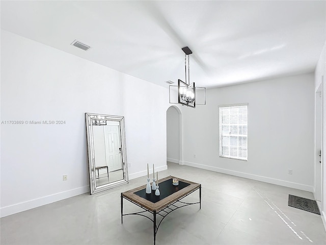 interior space featuring an inviting chandelier