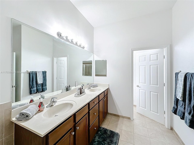 bathroom with vanity and tile patterned floors