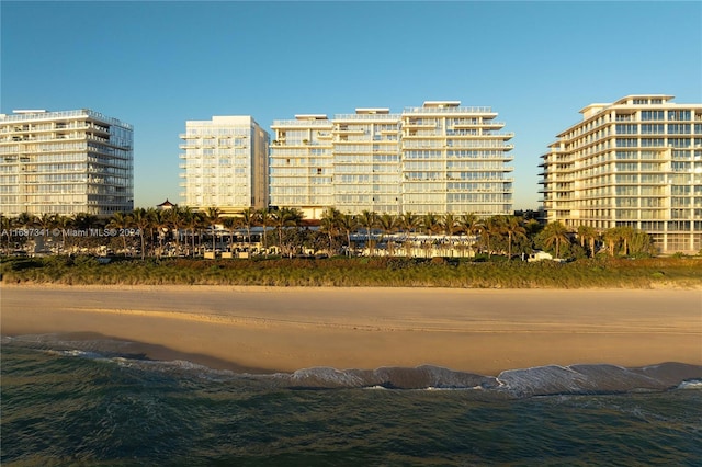 view of building exterior with a water view