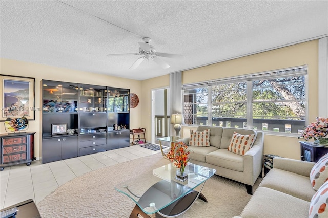 3029 Berkshire B 3029, Deerfield Beach, FL 33442 - living room featuring tile patterned flooring, a textured ceiling, and a ceiling fan