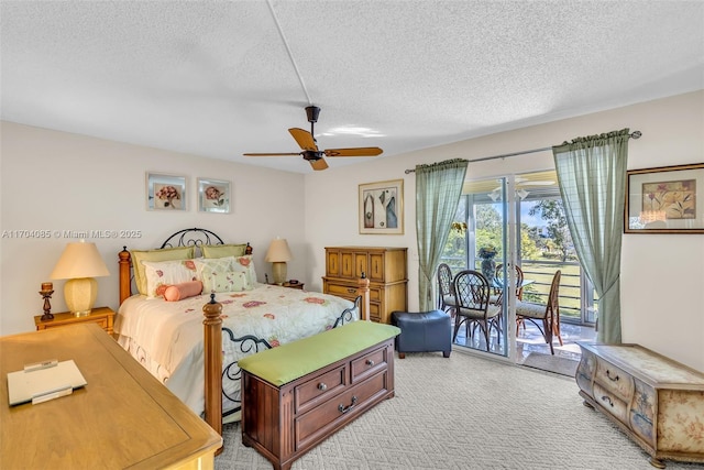 3029 Berkshire B 3029, Deerfield Beach, FL 33442 - bedroom with light carpet, a ceiling fan, access to exterior, and a textured ceiling