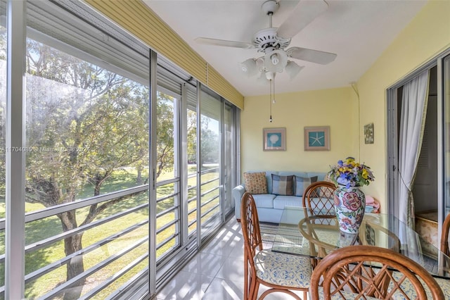 sunroom / solarium with ceiling fan