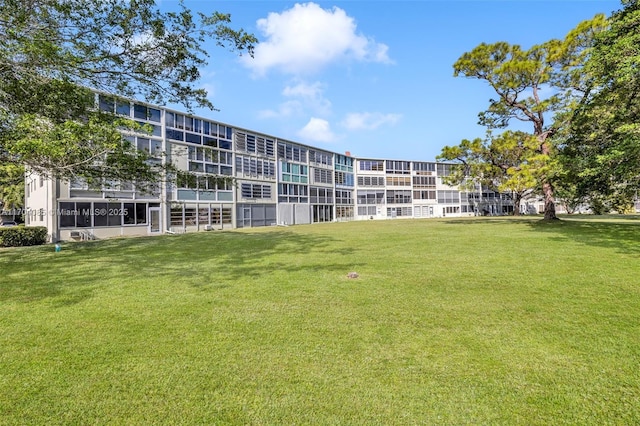 3029 Berkshire B 3029, Deerfield Beach, FL 33442 - surrounding community featuring a lawn