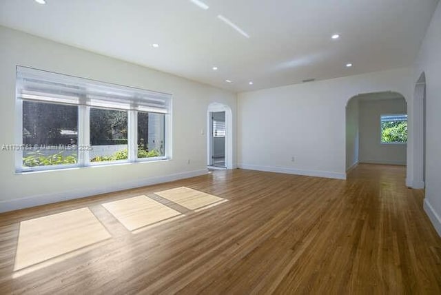 spare room featuring hardwood / wood-style flooring