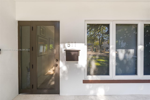 511 Madeira Ave, Coral Gables, FL 33134 - property entrance with stucco siding