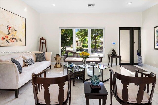 511 Madeira Ave, Coral Gables, FL 33134 - living room with recessed lighting and baseboards
