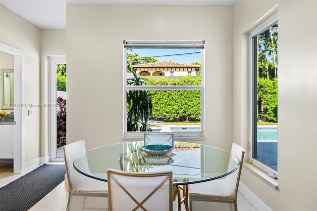 511 Madeira Ave, Coral Gables, FL 33134 - dining area featuring baseboards