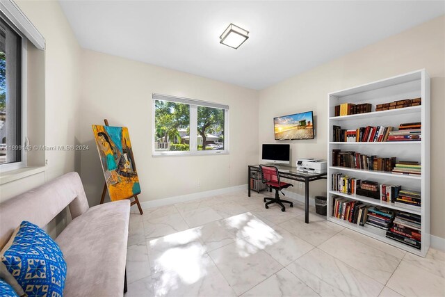 511 Madeira Ave, Coral Gables, FL 33134 - home office with baseboards and marble finish floors