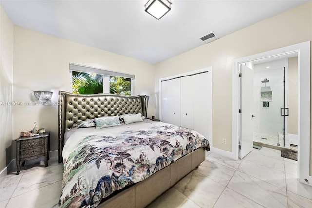 511 Madeira Ave, Coral Gables, FL 33134 - bedroom with a closet, baseboards, ensuite bathroom, and marble finish flooring