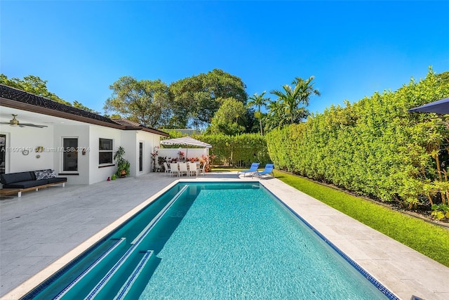 511 Madeira Ave, Coral Gables, FL 33134 - swimming pool with a patio and a ceiling fan