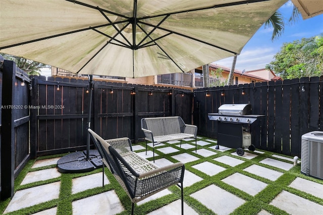 view of patio featuring an outdoor hangout area, cooling unit, and grilling area