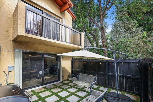 view of patio / terrace with a balcony