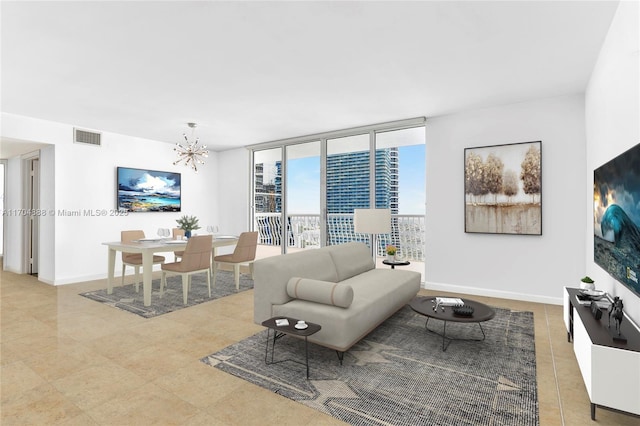 tiled living room featuring floor to ceiling windows and a notable chandelier