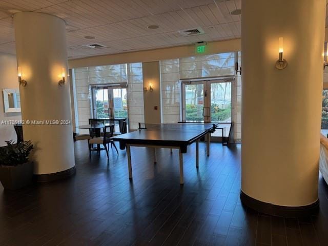 rec room featuring hardwood / wood-style flooring and french doors