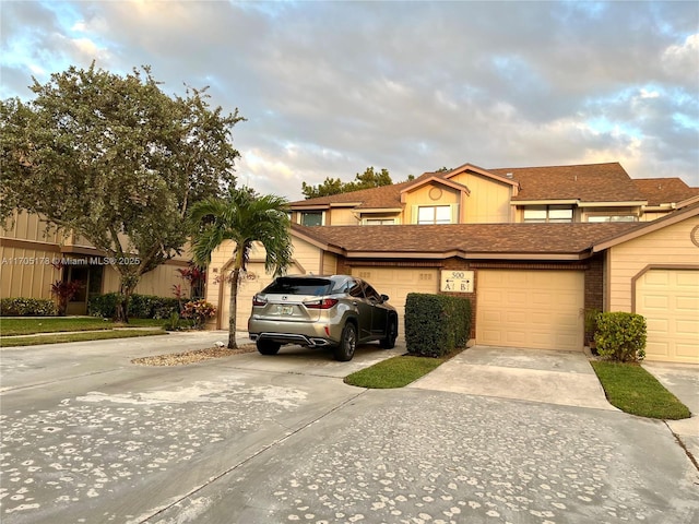 front of property with a garage