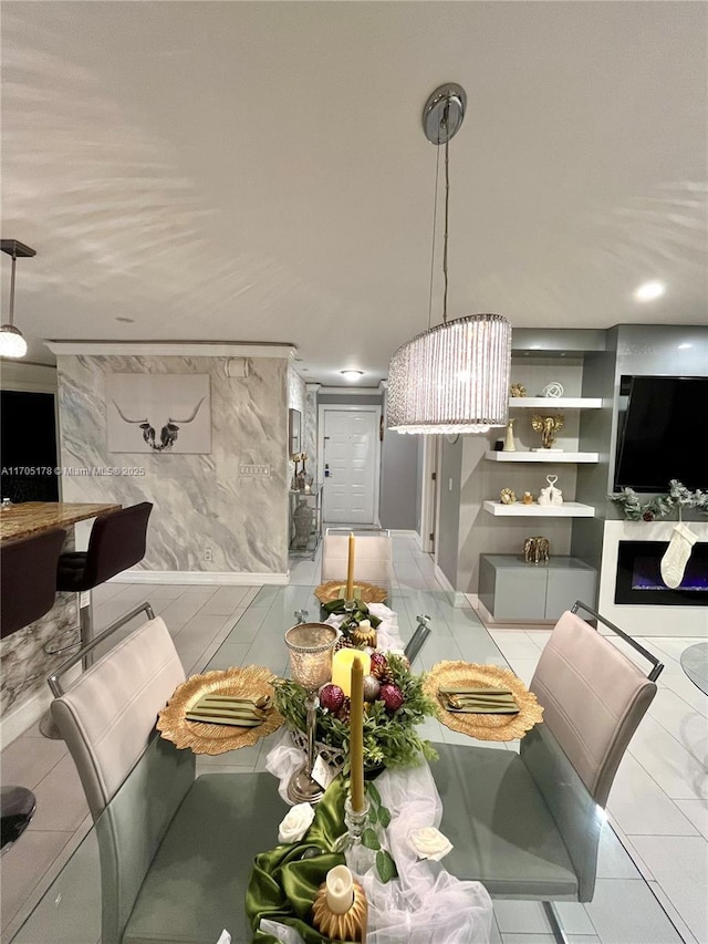 tiled dining area featuring built in features