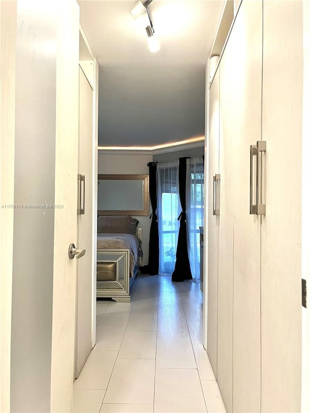 hallway with light tile patterned flooring