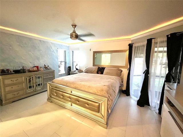 bedroom with ceiling fan and crown molding