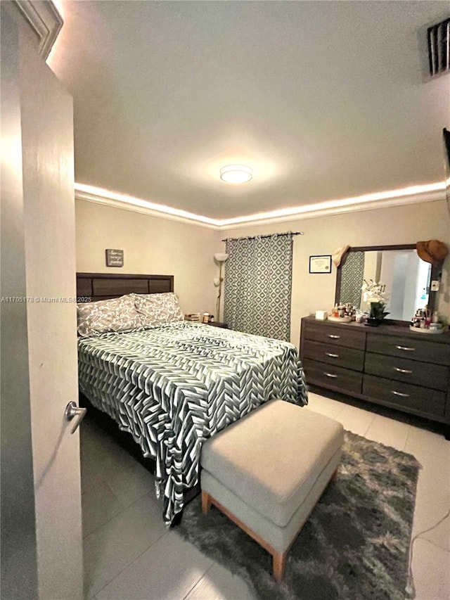 bedroom featuring light tile patterned floors