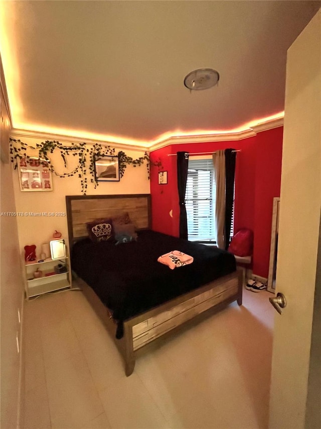 bedroom with ornamental molding