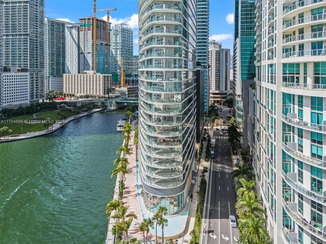 property's view of city featuring a water view