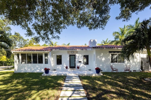 view of front of house with a front yard