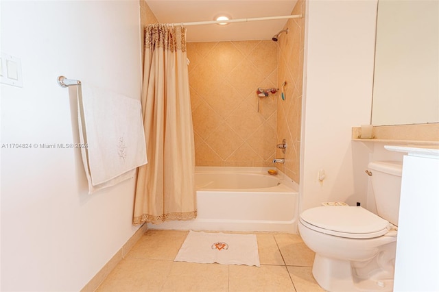 bathroom featuring tile patterned floors, toilet, and shower / bath combo with shower curtain