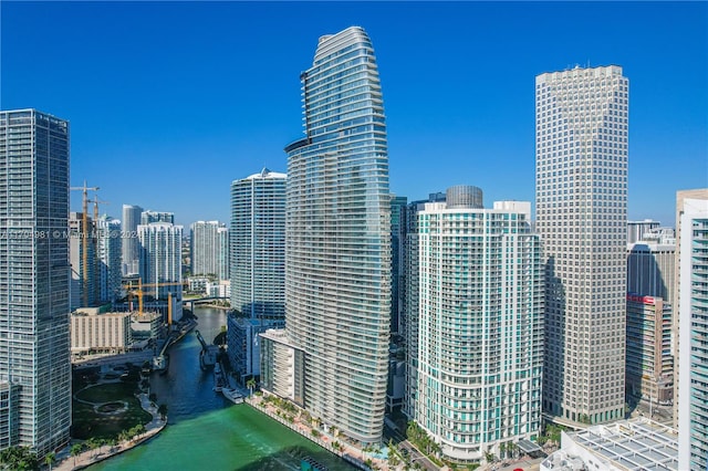 property's view of city featuring a water view