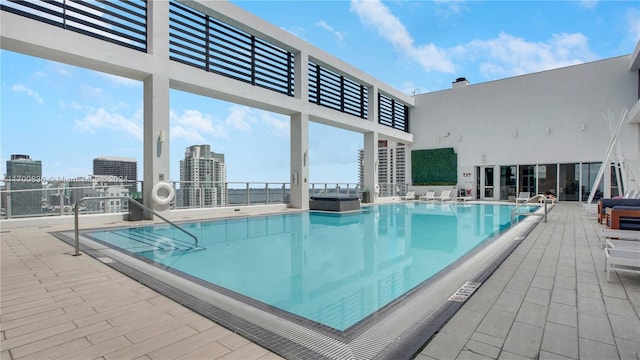 view of pool featuring a patio