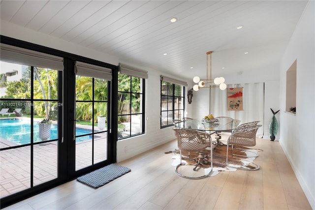 dining area featuring light wood-type flooring