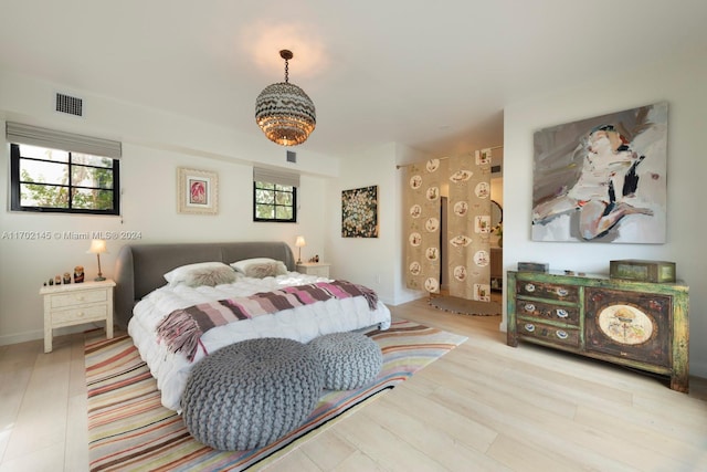 bedroom featuring light wood-type flooring