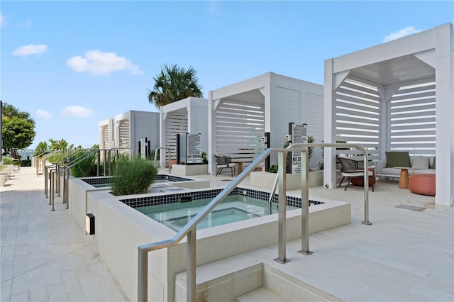 view of swimming pool featuring an in ground hot tub