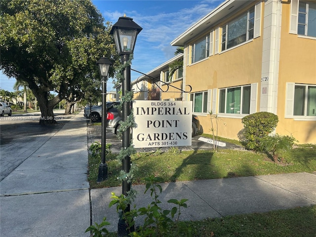 view of community sign