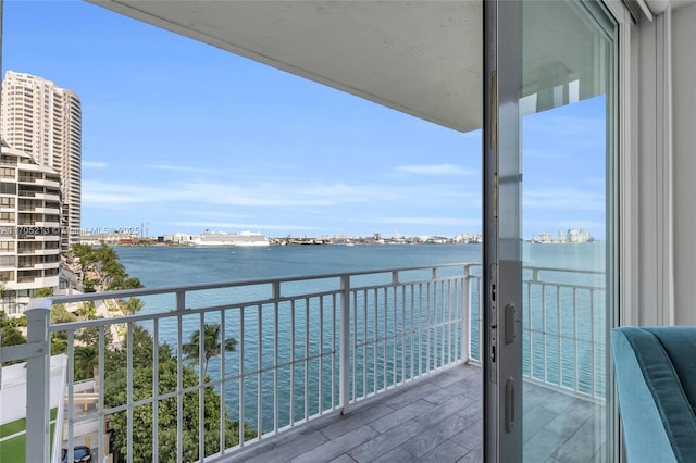 balcony featuring a water view