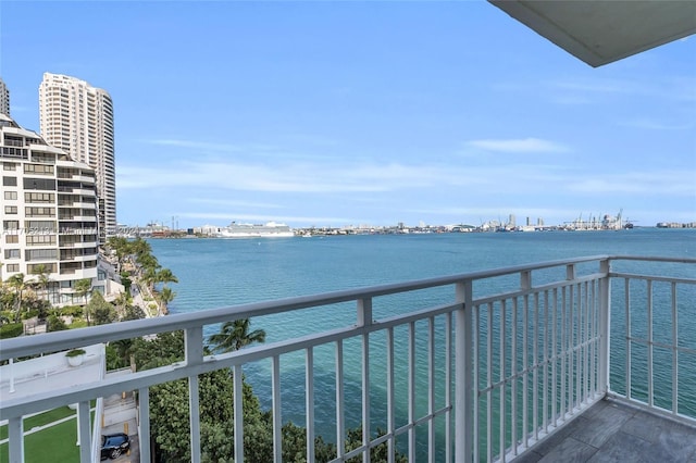 balcony featuring a water view