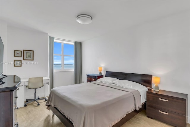 bedroom with a water view