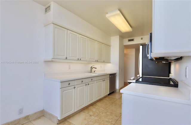 kitchen featuring visible vents, white cabinetry, range with electric cooktop, a sink, and dishwasher