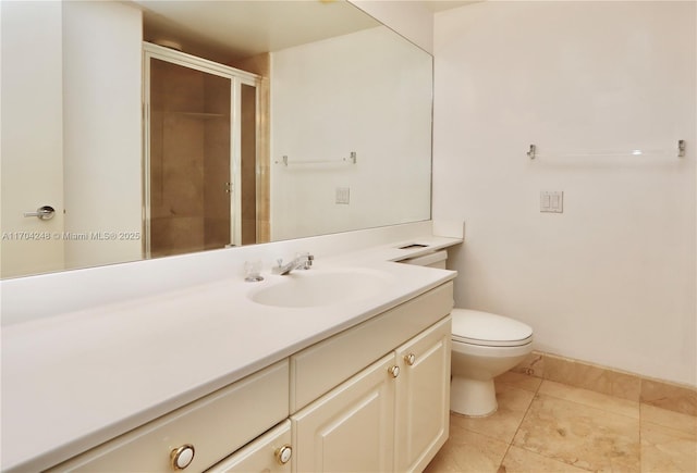 bathroom with tile patterned flooring, vanity, an enclosed shower, and toilet