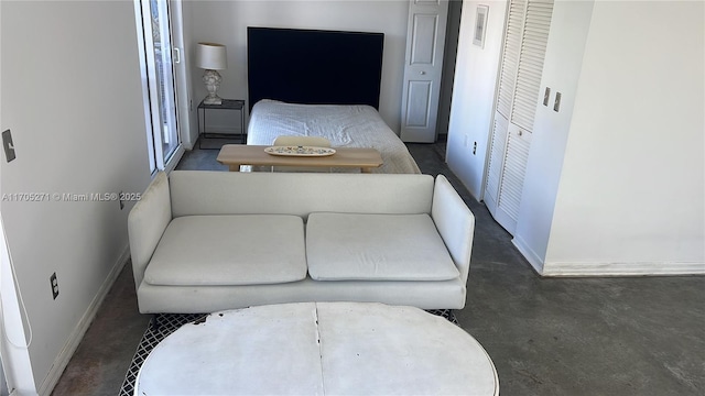 bedroom featuring baseboards