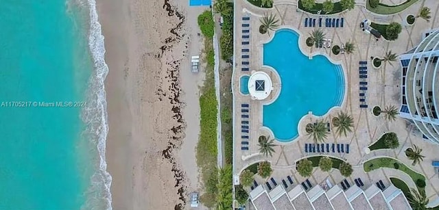 aerial view with a view of the beach and a water view