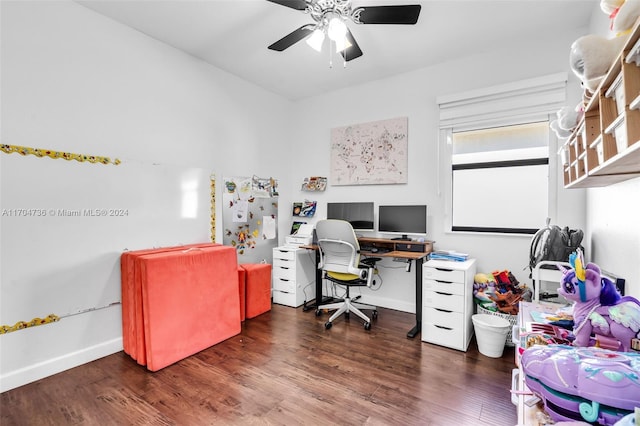 office with ceiling fan and dark wood-type flooring