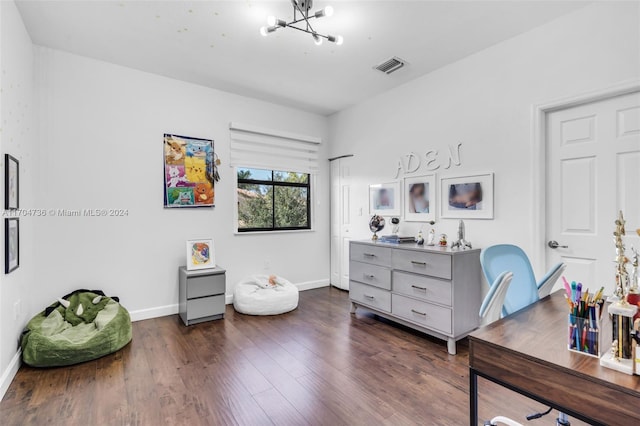 office area featuring dark hardwood / wood-style flooring and an inviting chandelier